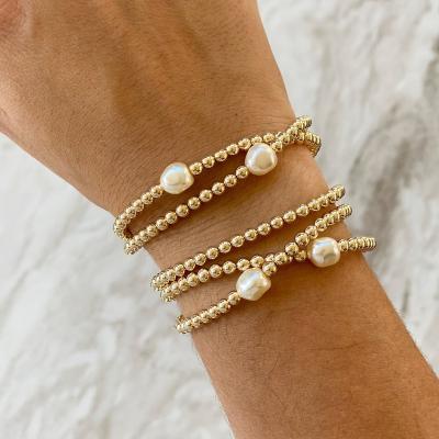 China Not Fade Classic 14k Gold Filled Stainless Steel Pearl Natural Freshwater Pearl Bracelet Beaded Stretch Stacking Bracelets For Women for sale