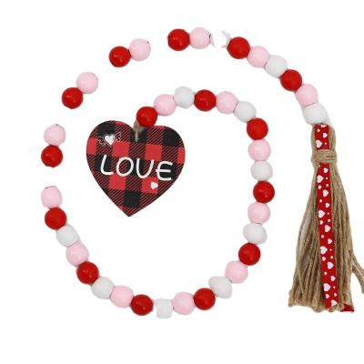 China 2022 Valentines Day Wood Decorations Natural Material Wooden Pearl Garland for sale