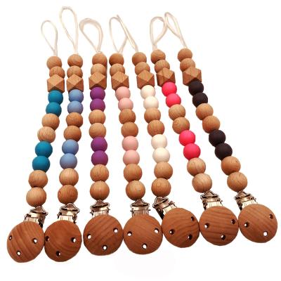 China Natural Wood and Silicone Teether Pacifier Chain Natural Material Baby Wooden Rings for sale