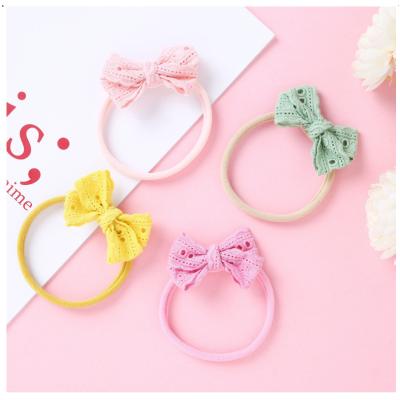 China XUFANG Fashion Baby Hairbandss Baby Hair Embroidery Cloth Hollow Classic Bow Soft Elastic Baby Headbands Accessories For Kids for sale