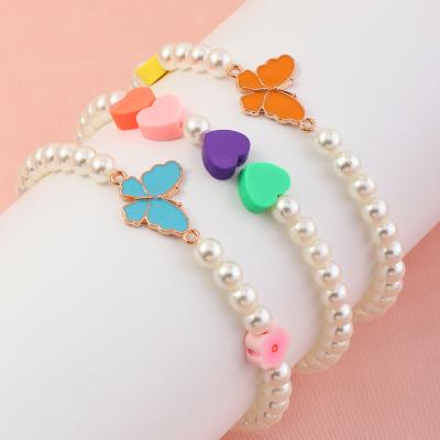 China XUFANG Cute 3pcs Sets Wholesale 2022 New Kids Bracelets Acrylic Butterfly Soft Glass Pottery Love Girls Beaded Bracelets for sale