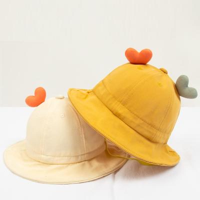 China XUFANG New Character Baby Hats Autumn Fashion Solid Color Cap Heart Tops Fisherman Hats Kids Sunshade Bucket Hats for sale