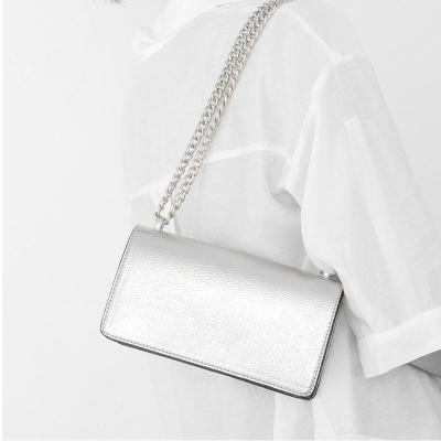 China 2023 Newest High Quality Small Silver PU Cross - Body Bag For Women Metal Strap Messenger Bag Ladies Handbags Phone Chain Purses for sale