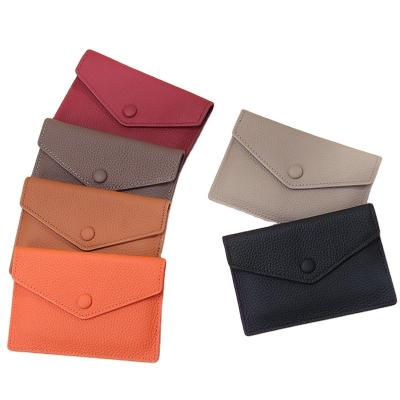 China No Card Genuine Leather Slim Wallet For Women Small Minimalist 6 Slots Cash Purse Button Closure Soft Credit Card Holders for sale