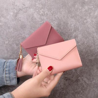 China 2020 New Women's Wallet Waterproof Small Tassel Stance Multi Bag Short Card Cool Leather Card Wallet for sale