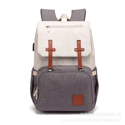 China 2019 new fashion multi function and large capacity color matching travel backpack mom bag for sale