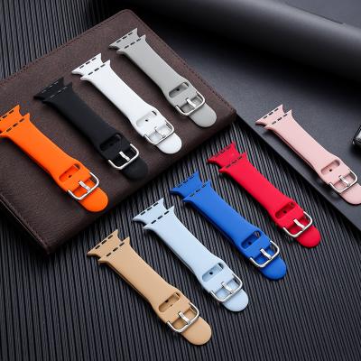 China Rubber Suitable for iwatch Strap Sports Pin Buckle Silicone Apple Watch Strap Monochrome Watch Band for sale