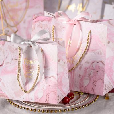 China Custom Retail Handmade Logo Printed Luxury Bouquet Clothing Matt Finish Pink Paper Bags Black Shopping Bag With Grosgrain Ribbon Handle for sale