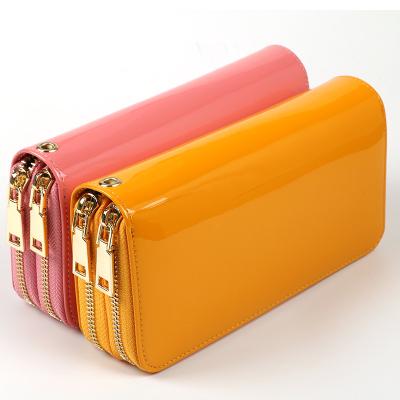 China Waterproof Mixed Design Stock Women Zipper Long Wallet Leather Ladies Purse for sale