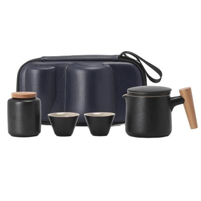 China Custom Made Stoneware Porcelain Teapot Set Durable Black Glazed Ceramic Travel Bag for sale