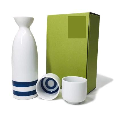 China Wholesale ebay modern simple hot white painting logo white Japanese style embossed cheap high quality ceramic sake bottle with two cups for sale