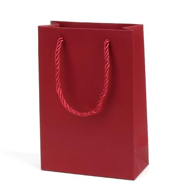 China Recycled Materials China Manufacturer Luxury Red Printed Custom Gift Shopping Paper Bags With Logo for sale