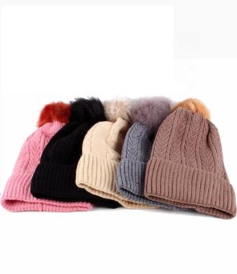 China COMMON acrylic slouch beanie ladies winter beanie hat with faux fur pom pom for girls for sale