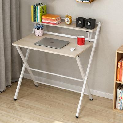 China Small Eco-friendly Foldable Single Bedroom Folding Writing Study Table Computer Desk With Shelf for sale