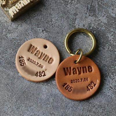 China Stocked Wholesale Personalized Adjustable Soft Leather Dog ID Tags Pet Accessories for sale