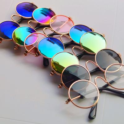 China New Luxury Pet Stocked Mini Glasses Pet Accessories Sunglasses for Cat and Dog Prevent Wind and UV Protection for sale