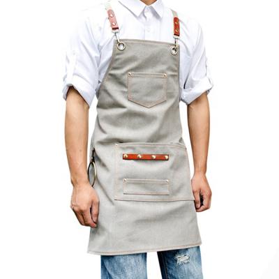 China Adjustable Back Cotton Canvas Cross Apron Cleaning Kitchen Cooking Baking Bib With Pockets For Women And Men for sale