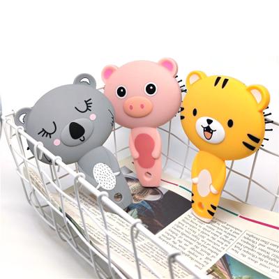 China Knock out the knot 2022 cute cartoon lovely hair brush for kid bear pig and tigers with cartoon animal styles stiffens hair brush for sale