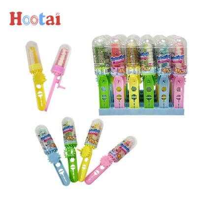 China Mini Funny Hand Shaking Swirl Natural Twist Lollipop Soft Hard Candy for sale