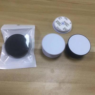 China Wholesale sublimation blank cell phone holder with opp bag,blank sublimation phone sockets for sale