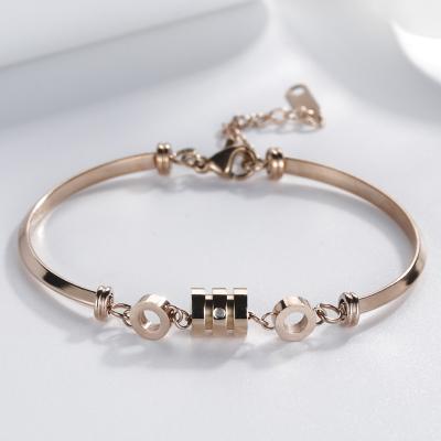 China High Quality Adjustable Reveal Skin Tone Rose Gold Girls Titanium Steel Bracelet Spring Ring Bracelet for sale