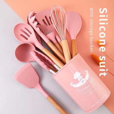 China Disposable Wooden Handle Kitchen Gadgets Utensils Set Nonstick Kitchen Cooking 12 Piece Silicone Cooking Utensil Set Set With Rack for sale