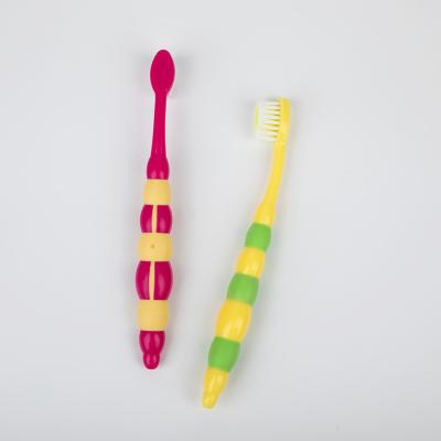 China Durable Type 2022 Child Toothbrush With Strong And Cute Polka Dots Custom Logo Toothbrush Wholesale Child Toothbrush for sale