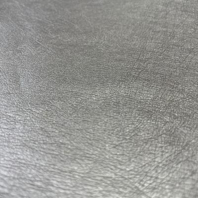 China Waterproof Anti Abrasion Leather Fabric 100% Synthetic PU Leather Upholstery For Garment for sale