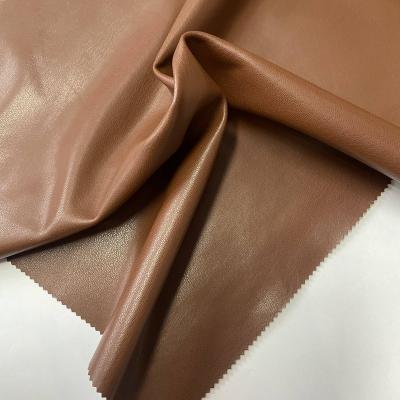 China PU Synthetic Leather Fabric of Faux Windproof Leather 0.55mm Thin Artificial Waterproof PU Leather for sale