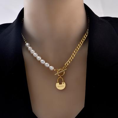 China FASHIONABLE personalized jewelry en inflight interceptor stainless steel zincir kolye lock pendant women beads stainless steel necklace for sale