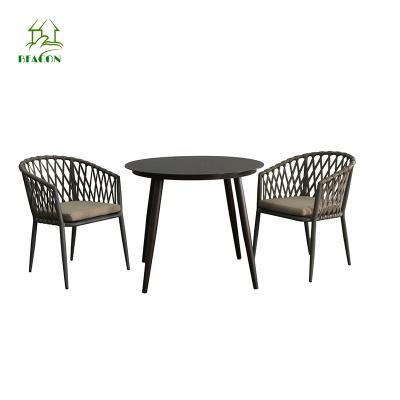 China Modern Modern Outdoor Furniture Garden Dining Table Set Outdoor Dining Table Rope Chair Dining Set for sale