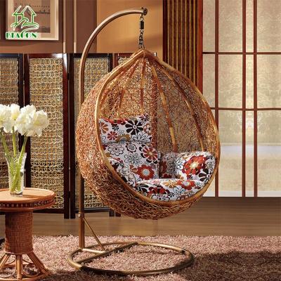 China Contemporary Heavy Duty Rattan Patio Garden Furniture Adult Indoor Wicker Swing Chair With Cushion for sale