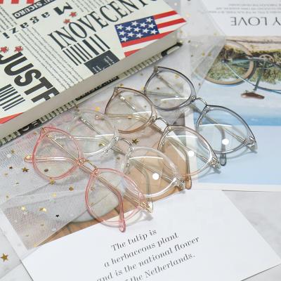 China RETRO ROUND GLASSES Customized Fashion Anti Blue Light Glasses Frame Vintage Round Semi Metal Glass TR90 Hot Selling Frame for sale