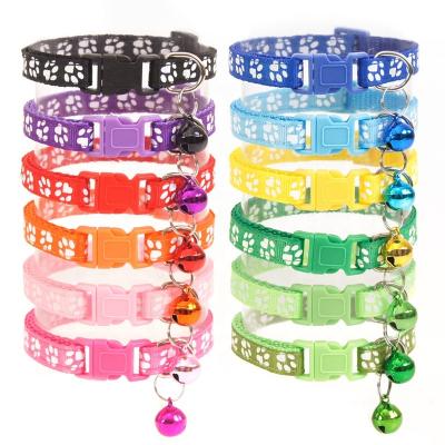 China Adjustable Dog Collar Manufacturer Stocked Wholesale Paw Print Nylon Pet Collar with Bell for Puppy and Cat for sale