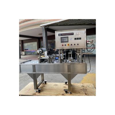 China Manual Full Automatic Plastic Cup Beverage Filling Filling Sealing Machine for sale