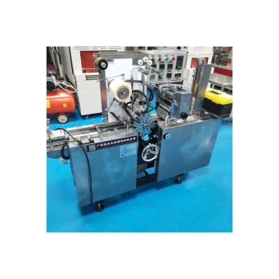 China Automatic Universal Three Dimensional Transparent Food PVC Film Packaging Machine for sale