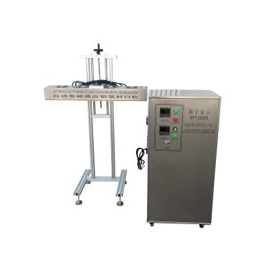 China food aluminum foil sealing machine, electromagnetic induction aluminum foil sealing machine, bottle mouth liner sealing machine for sale