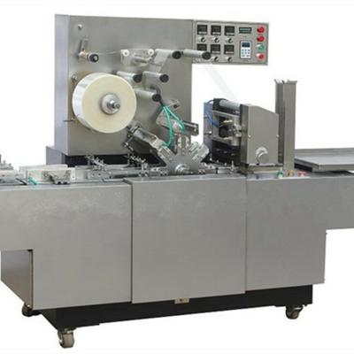 China Fully automatic multi-functional three-dimensional transparent food film packaging machine for sale