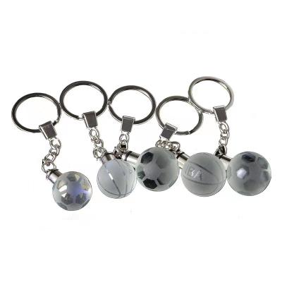 China Crystal LED Basketball Football Backpack Key Chain Pendants Couple Beam Creative Pendant Led Crystal Ball Key Chain for sale