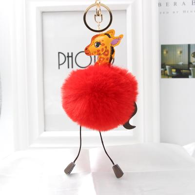 China Newest Inmitate Rabbit Fur DesignVived Giraffe Shaped Kids Pom Pom Fur Ball Key Chain Women Ladies for sale