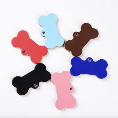 China Personalized Custom Leather Dog Tag Pet Cowhide Sheer Pet Hanging Cow Tag For Sale for sale