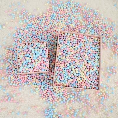 China Custom Round Ball Foam Meteor Dream Planet Macaron Color Small Particle Gift Box Filling Material for sale