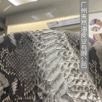 China Wrinkle Resistant Imported Natural Python Skin Primary Color Python Clothing Bags Fashion Rare Leather for sale