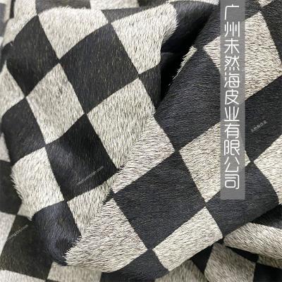 China Wrinkle Resistant Gray Plaid Black Cow Leather Hair 3.8cm Printed Real Cow Fur Other Widths Can Be Ordered Cow Fur Leather for sale