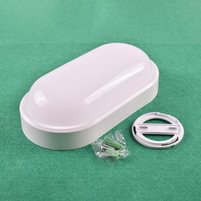 China Borosilicate White Oval 110lm/w IP65 15w Outdoor Waterproof LED Glass Bulkhead Light For Wall for sale