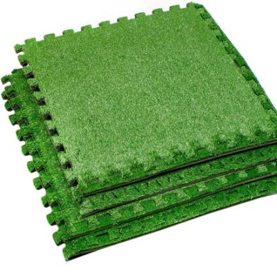 China Indoor and Outdoor Sports Equipment Safety Turf Tile Shock Absorption Skid - Proof Artificial Grass Puzzle Mat Mat for sale