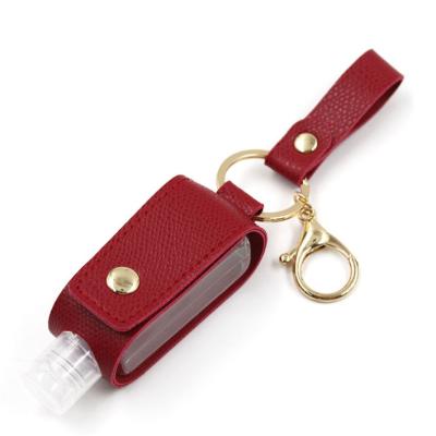 China Classic Belt Christmas Leather Hand Sanitizer Bottle Holder Key Chain Bags Portable Travel Pocket Hand Sanitizer Holder for sale