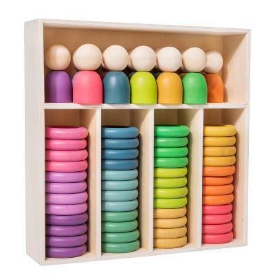 China Environmental Material Kids Toys Montessori Rainbow wooden sets ring dolls matching educational games babies color recognition for sale