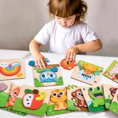 China Environmental Wooden creative cartoon 3D stereoscopic puzzle for children's early education block blocks snap hand grab board educational toys for sale