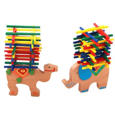 China Eco-friendly Material Elephant Kids Montessori Educational Beech Wooden Toys Cow Balance Balancing Blocks Wood Toy for Children for sale